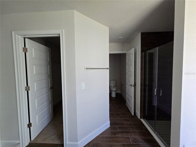 5045 N Triple Eagle Path, Beverly Hills, FL 34465 - corridor with wood finish floors and a textured ceiling