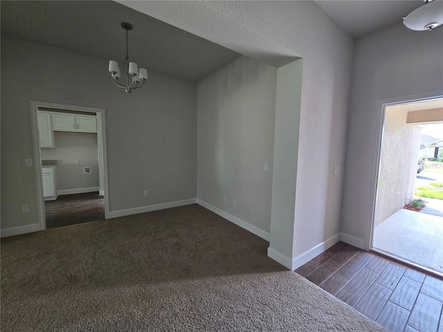 5045 N Triple Eagle Path, Beverly Hills, FL 34465 - unfurnished room with a chandelier and dark colored carpet