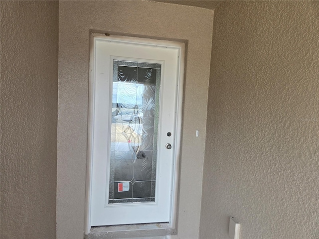 310 W Rexford Dr, Beverly Hills, FL 34465 - entrance to property with stucco siding