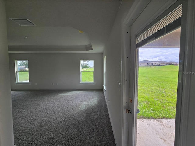 310 W Rexford Dr, Beverly Hills, FL 34465 - empty room featuring carpet flooring and a tray ceiling