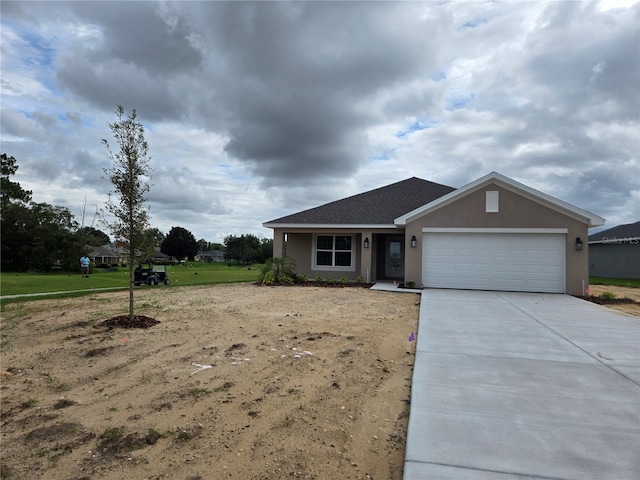 310 W Rexford Dr, Beverly Hills, FL 34465 - ranch-style house featuring an attached garage, stucco siding, and concrete driveway
