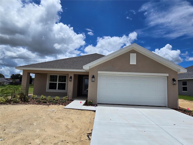 310 W Rexford Dr, Beverly Hills, FL 34465 - ranch-style house with stucco siding, an attached garage, driveway, and a shingled roof