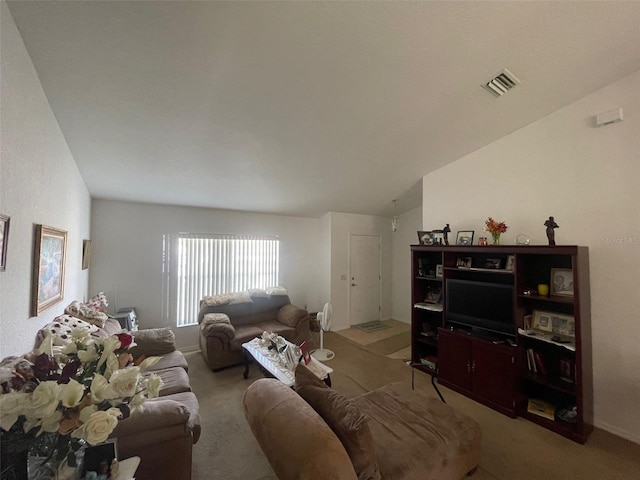 living room with visible vents and light colored carpet