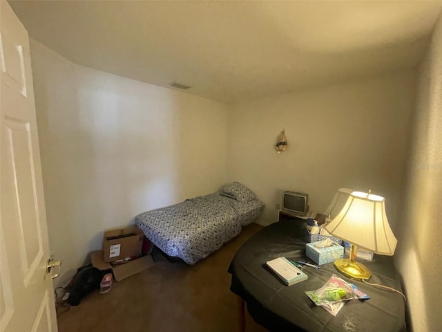 bedroom with carpet and visible vents