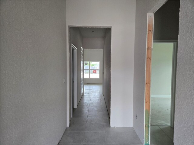 253 W Twisted Oaks Dr, Beverly Hills, FL 34465 - corridor with a textured wall and tile patterned floors