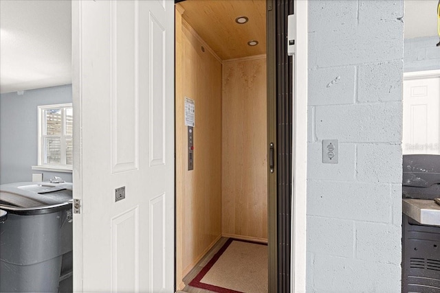 room details featuring concrete block wall