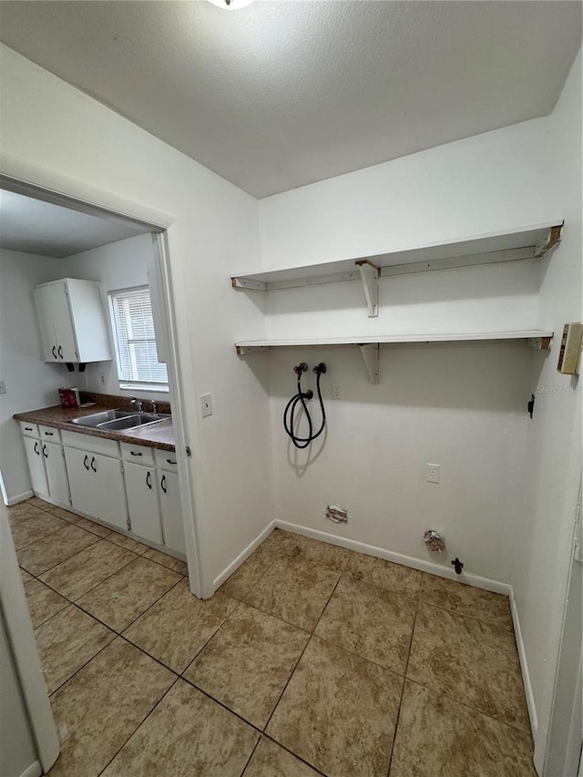333 Marion Oaks Dr, Ocala, FL 34473 - washroom with baseboards, hookup for a washing machine, a sink, and laundry area