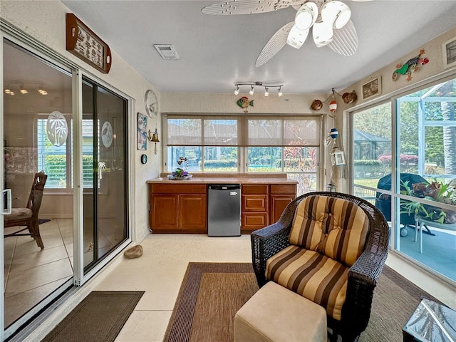 sunroom / solarium featuring visible vents