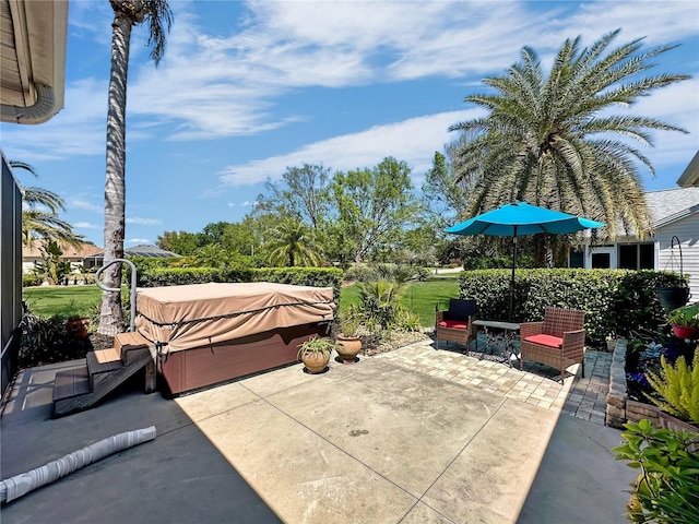 view of patio with a hot tub