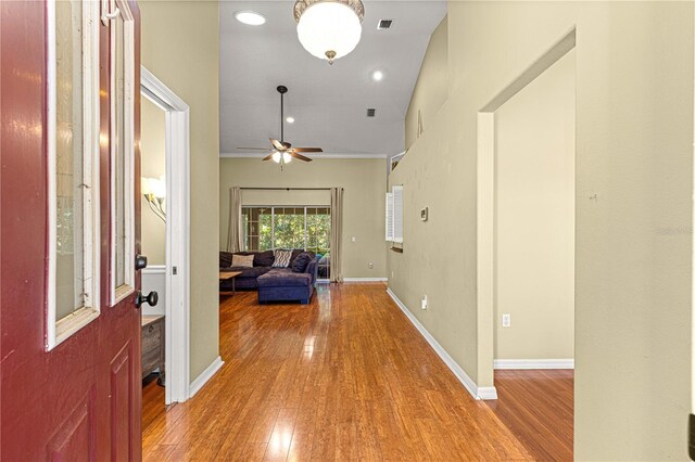 2922 SE 39th Pl, Ocala, FL 34480 - entrance foyer with baseboards, wood finished floors, and a ceiling fan