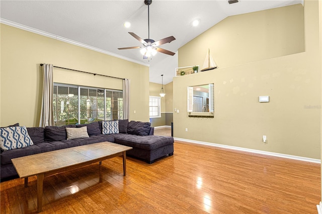 2922 SE 39th Pl, Ocala, FL 34480 - living area featuring crown molding, high vaulted ceiling, baseboards, light wood-style floors, and ceiling fan