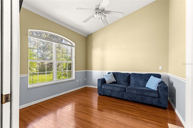 2922 SE 39th Pl, Ocala, FL 34480 - living area with wood-type flooring, baseboards, lofted ceiling, and ceiling fan