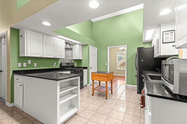 2922 SE 39th Pl, Ocala, FL 34480 - kitchen featuring baseboards, stainless steel appliances, white cabinetry, open shelves, and light tile patterned floors