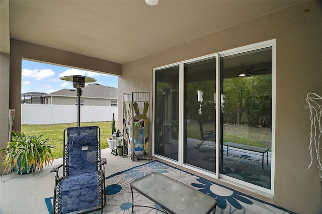 view of patio featuring fence