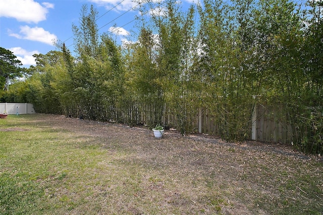 view of yard with fence