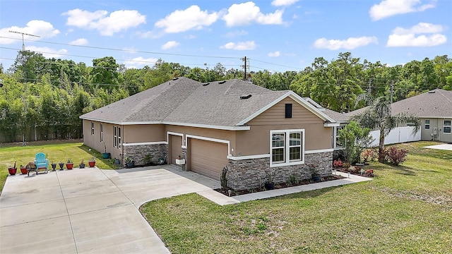 view of front of property featuring a front lawn, stucco siding, an attached garage, and stone siding