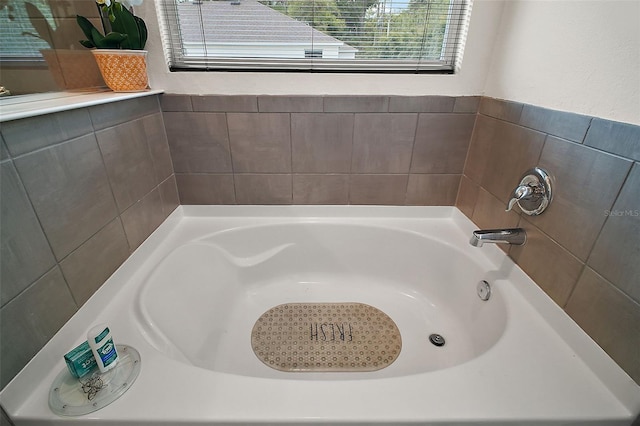 bathroom featuring a bath
