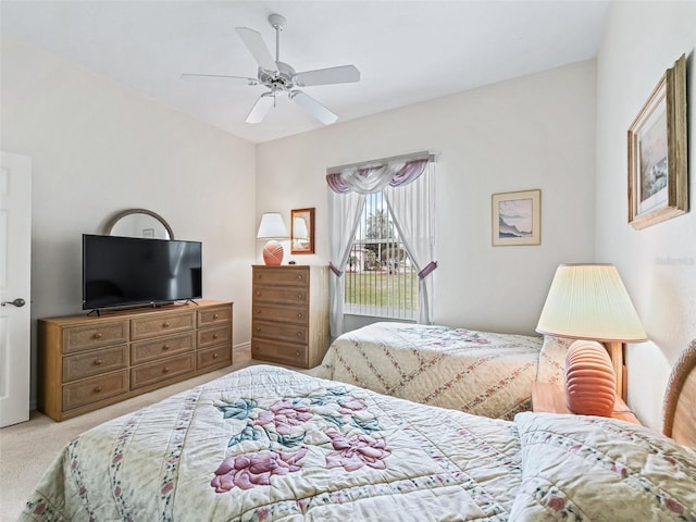 bedroom featuring carpet flooring and a ceiling fan