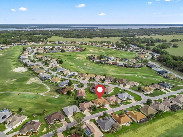 bird's eye view featuring view of golf course and a residential view