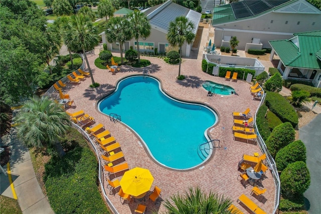 community pool with a patio