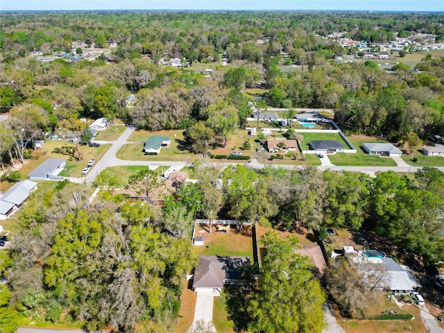 4575 SE 137th Pl, Summerfield, FL 34491 - bird's eye view with a wooded view and a residential view