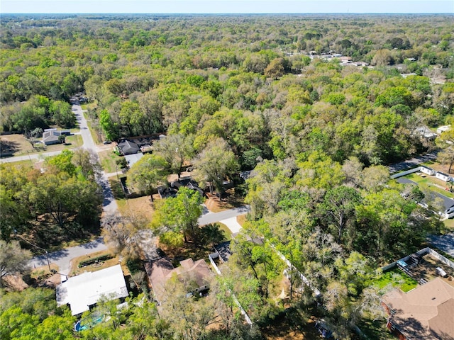 4575 SE 137th Pl, Summerfield, FL 34491 - birds eye view of property with a wooded view