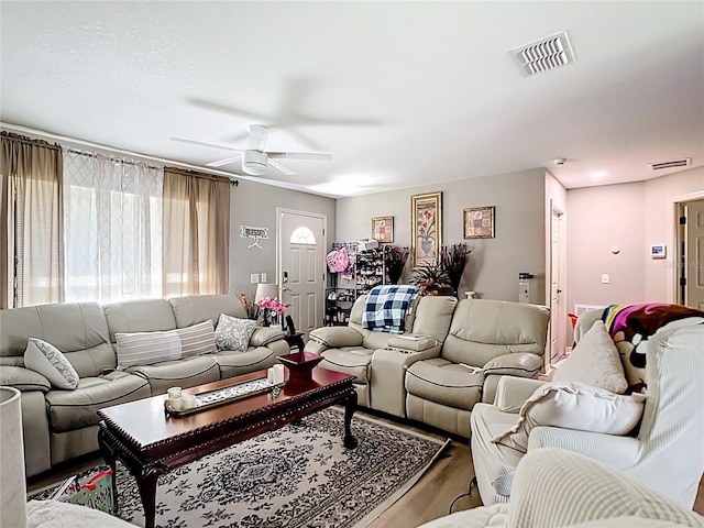 4575 SE 137th Pl, Summerfield, FL 34491 - living room with visible vents, wood finished floors, and ceiling fan