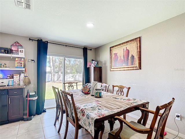 4575 SE 137th Pl, Summerfield, FL 34491 - dining space with light tile patterned flooring, baseboards, and visible vents