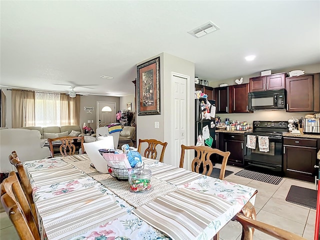 4575 SE 137th Pl, Summerfield, FL 34491 - dining room with ceiling fan, visible vents, and light tile patterned floors