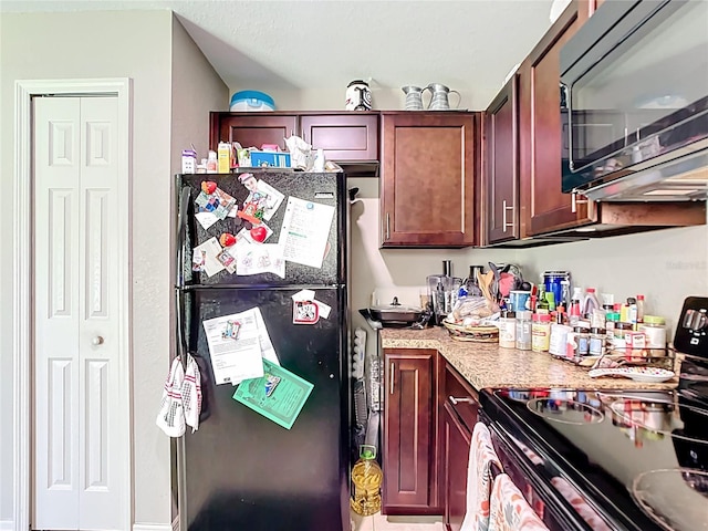 4575 SE 137th Pl, Summerfield, FL 34491 - kitchen with black appliances