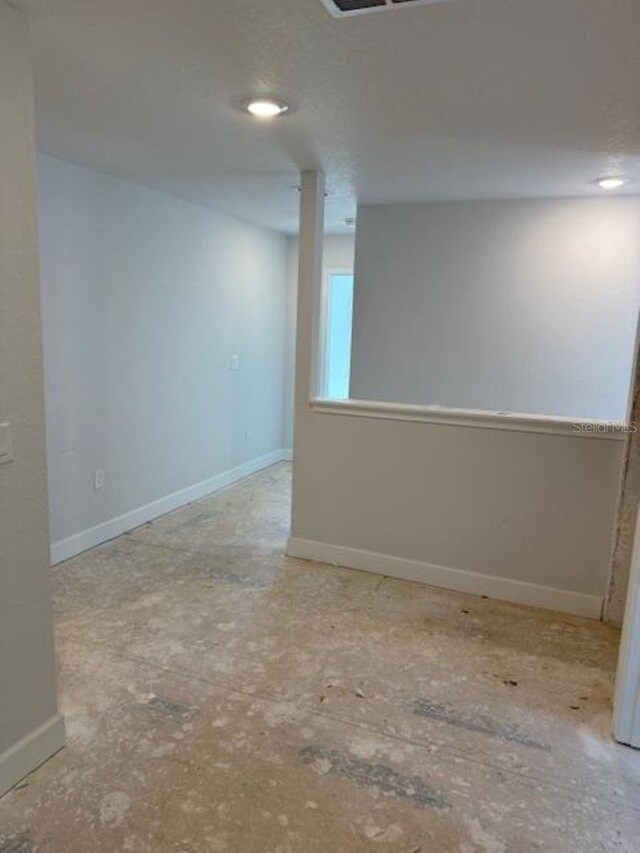 2218 NW 23rd Loop, Ocala, FL 34475 - basement with baseboards and recessed lighting