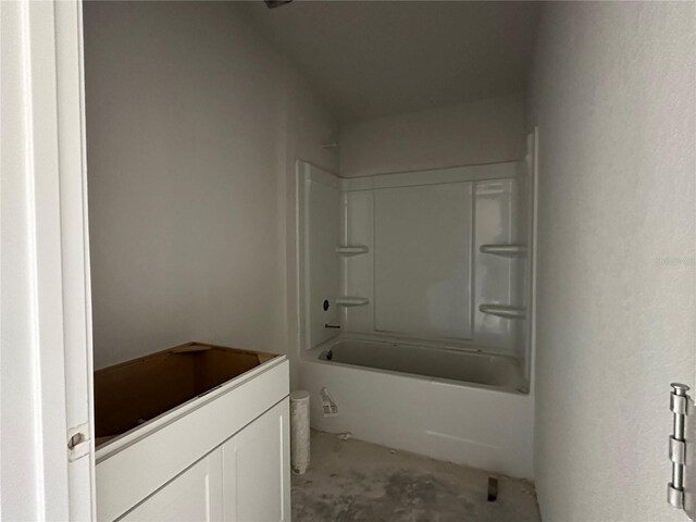 4522 SW 90th Lane Rd, Ocala, FL 34476 - bathroom with bathtub / shower combination, vanity, and unfinished concrete floors