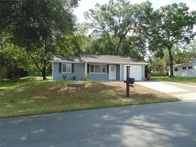 10955 SW 89th Ave, Ocala, FL 34481 - ranch-style house featuring driveway, an attached garage, and a front lawn