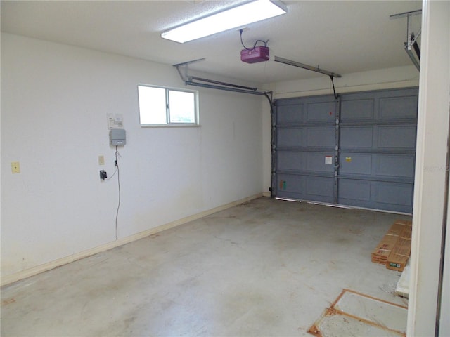 10955 SW 89th Ave, Ocala, FL 34481 - garage with a garage door opener and baseboards