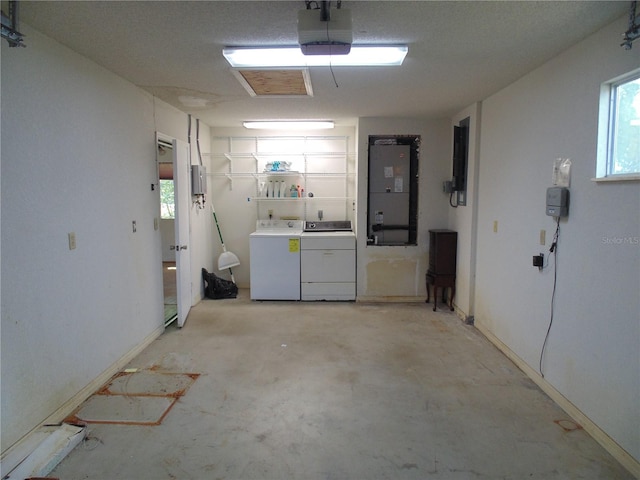 10955 SW 89th Ave, Ocala, FL 34481 - garage featuring a garage door opener and separate washer and dryer
