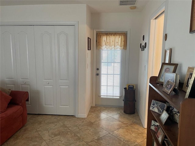 entryway featuring visible vents
