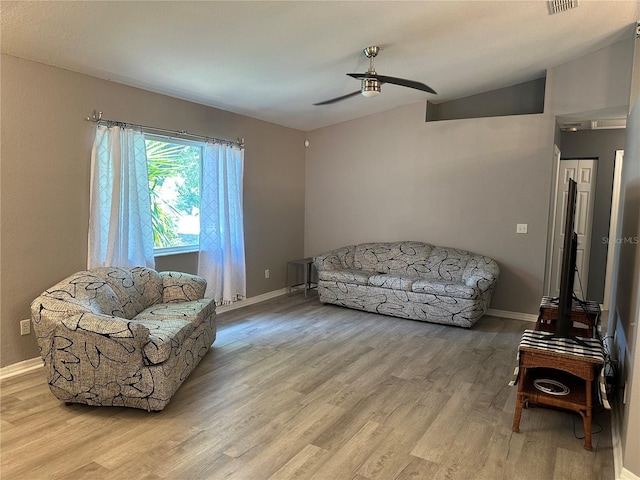 6082 SW 104th St, Ocala, FL 34476 - living area with vaulted ceiling, a ceiling fan, wood finished floors, and baseboards