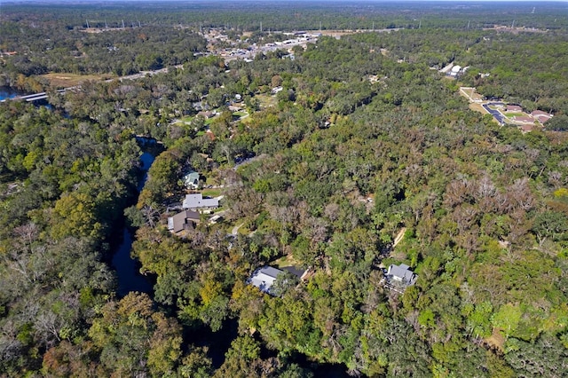 drone / aerial view with a view of trees