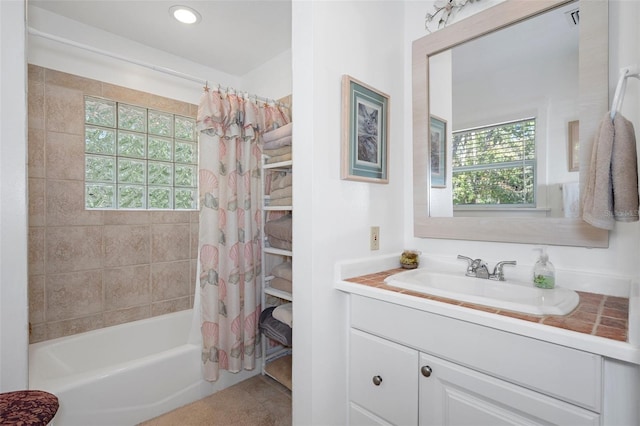 bathroom featuring shower / bath combination with curtain, tile patterned flooring, vanity, and recessed lighting