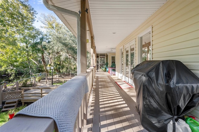 deck featuring a grill