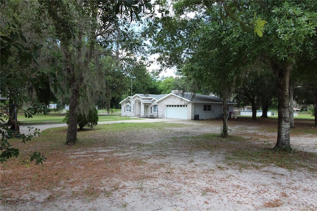 view of yard featuring a garage