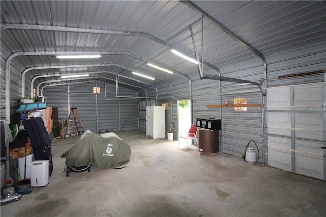 garage featuring metal wall
