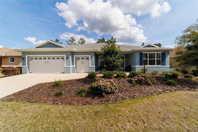 10445 SW 90th Street Rd, Ocala, FL 34481 - ranch-style house featuring stucco siding, an attached garage, concrete driveway, and a front yard
