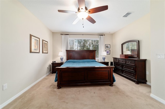 10445 SW 90th Street Rd, Ocala, FL 34481 - bedroom with light carpet, baseboards, and ceiling fan