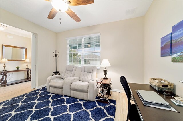 10445 SW 90th Street Rd, Ocala, FL 34481 - office area with wood finished floors, ceiling fan, and baseboards