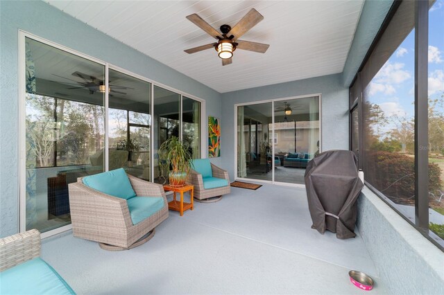 10445 SW 90th Street Rd, Ocala, FL 34481 - sunroom / solarium featuring a ceiling fan and an outdoor hangout area