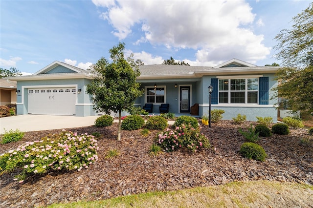 10445 SW 90th Street Rd, Ocala, FL 34481 - single story home with stucco siding, covered porch, concrete driveway, and an attached garage