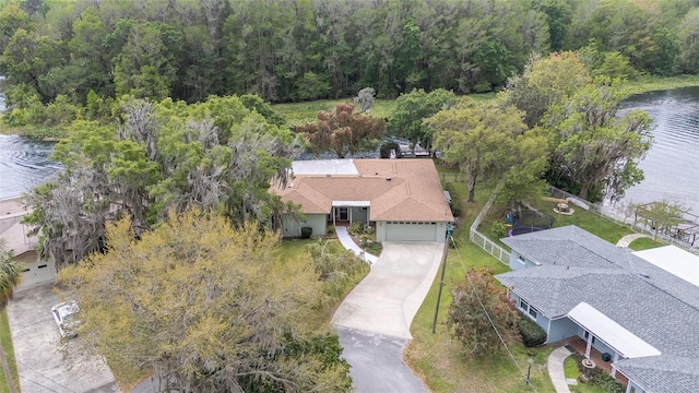 12180 Maple St, Dunnellon, FL 34432 - view from above of property with a large body of water and a heavily wooded area
