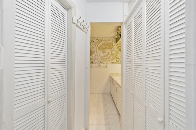 12180 Maple St, Dunnellon, FL 34432 - hallway featuring light tile patterned flooring