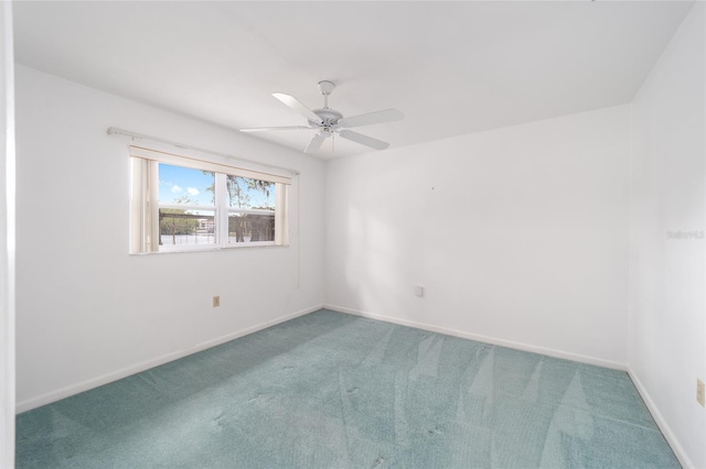 12180 Maple St, Dunnellon, FL 34432 - carpeted spare room featuring ceiling fan and baseboards